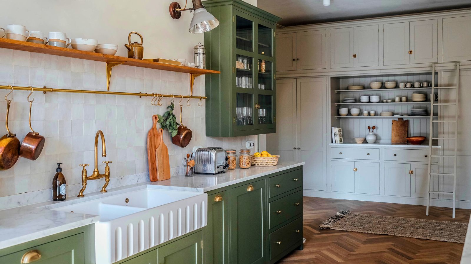 Kitchen with open shelving and green cabinets